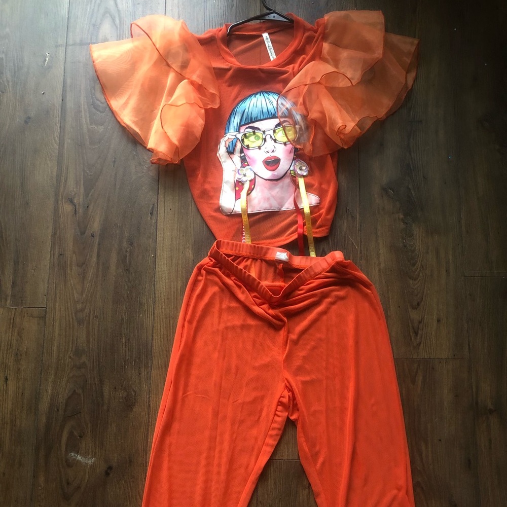 Two pierce orange pants suit $5